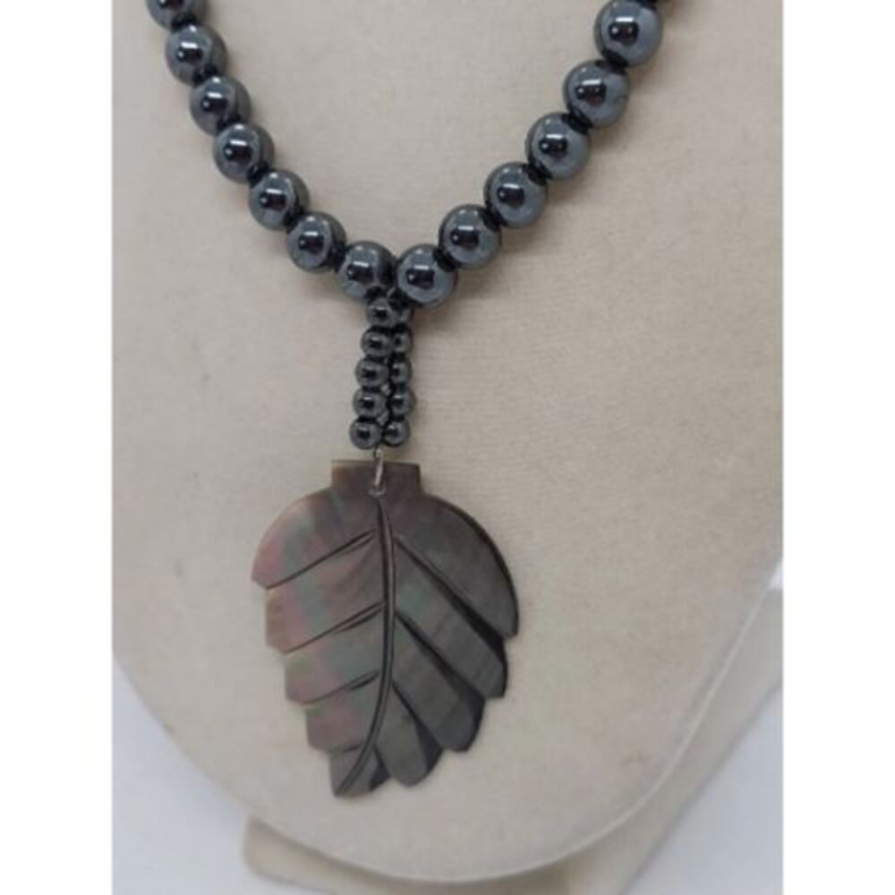 Vintage‎ hematite necklace with carved shell